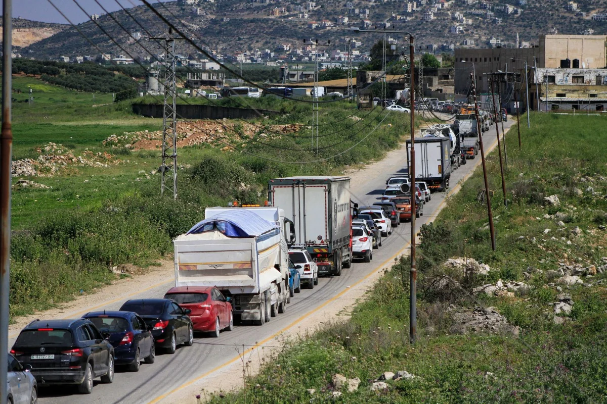 A line of cars on a road.